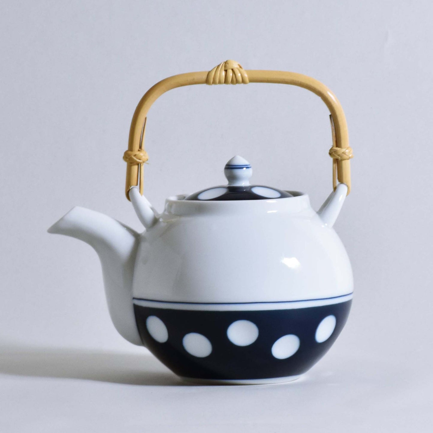 Polka dot S-shaped teapot