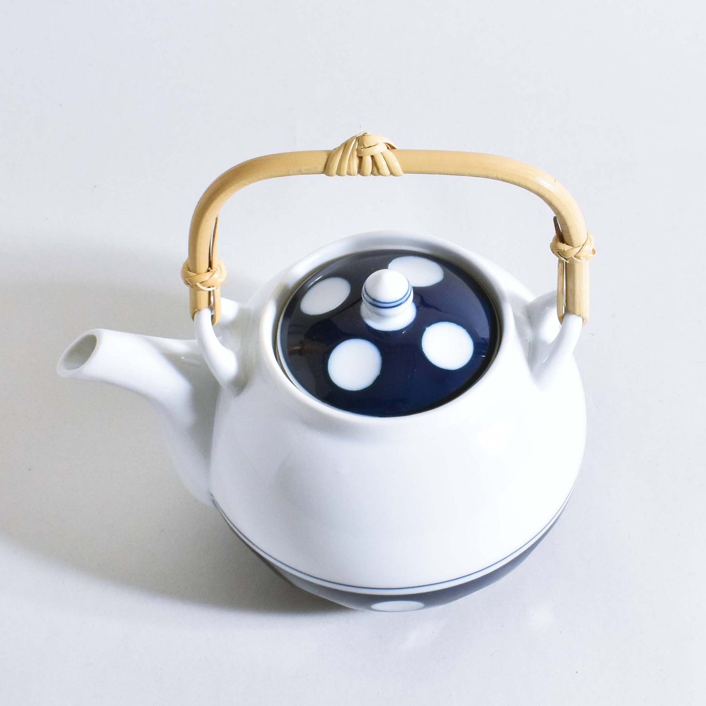 Polka dot S-shaped teapot