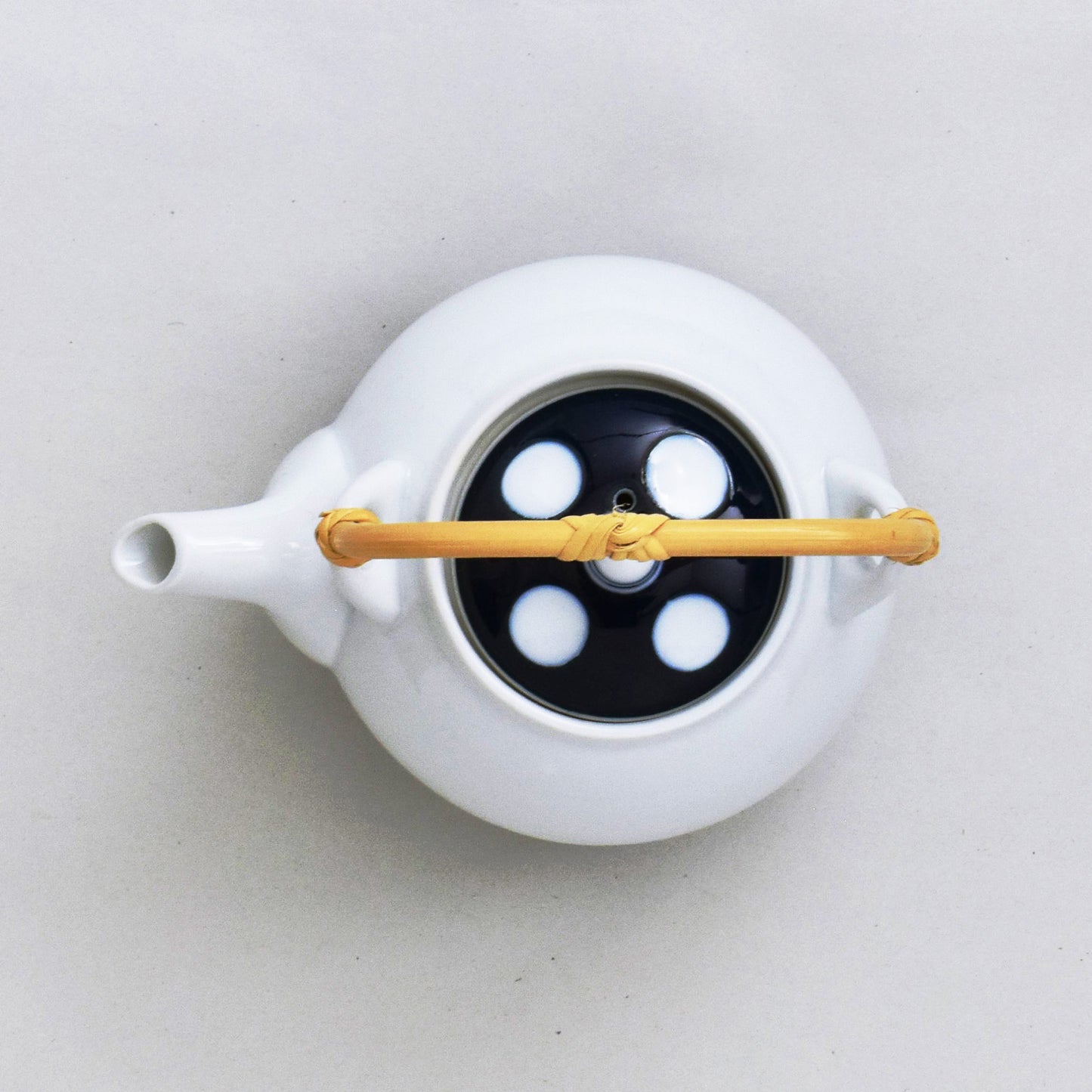 Polka dot S-shaped teapot