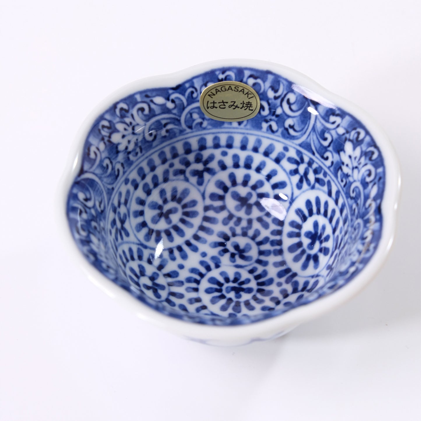 Small hexagonal flower decoration with arabesque border