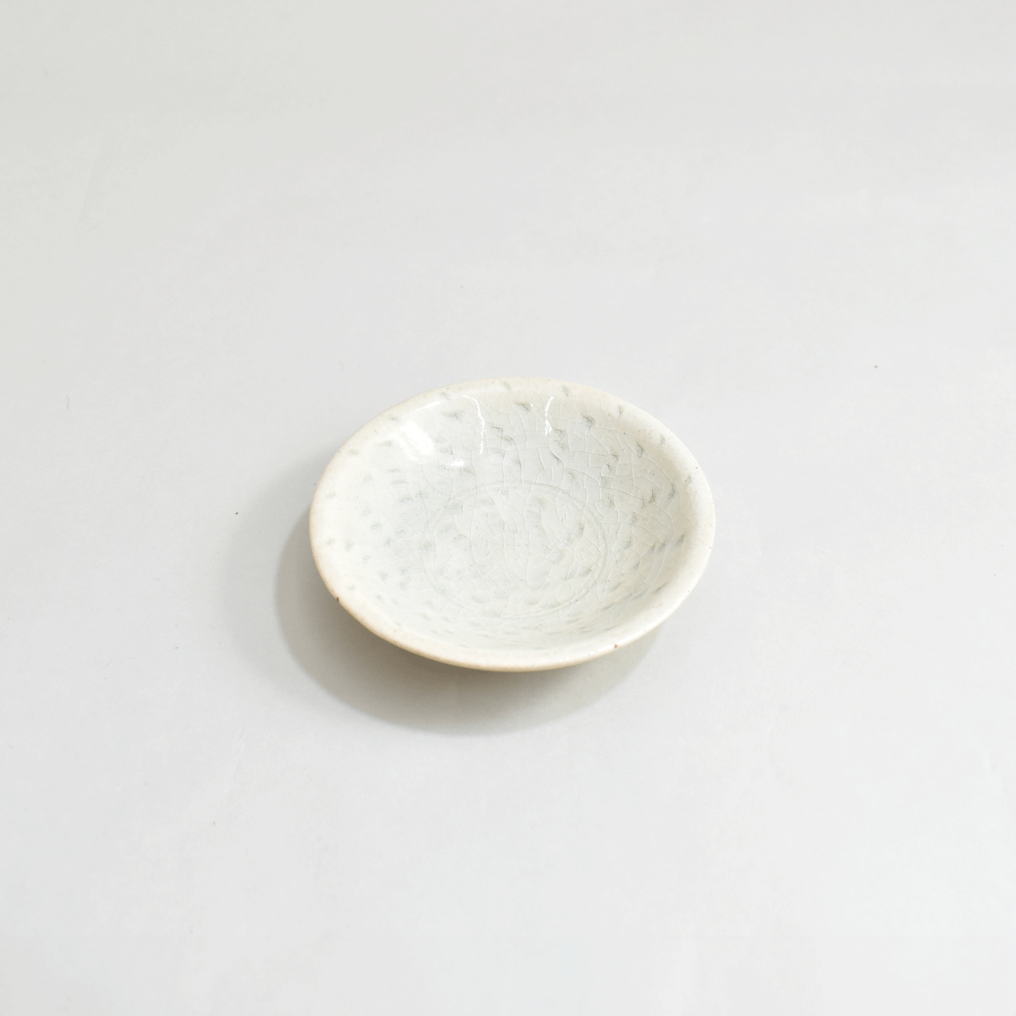 Small plate with high base