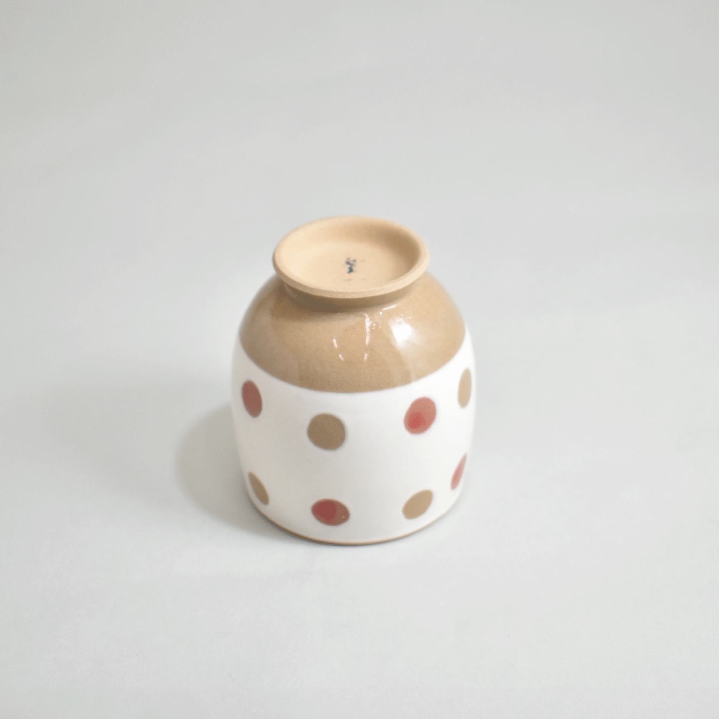 Inside and outside polka dot cup