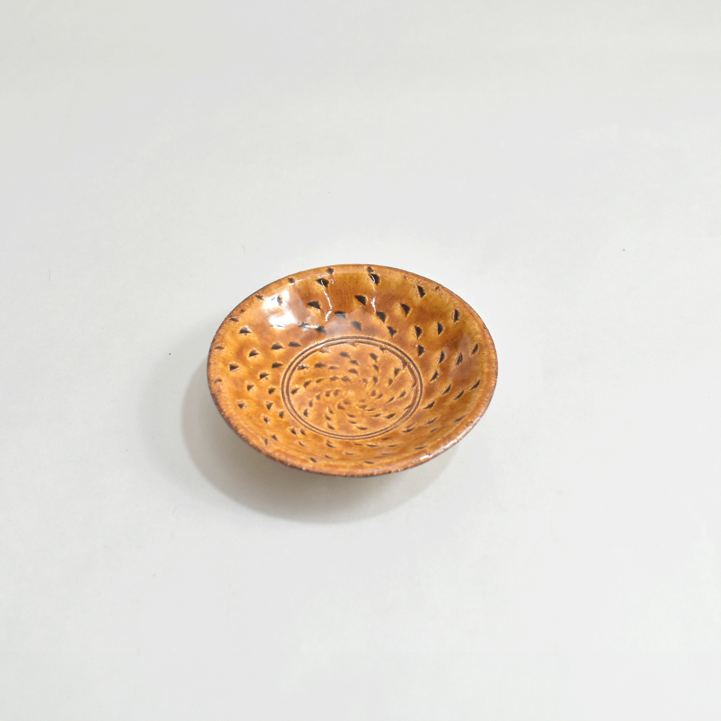 Small plate with high base