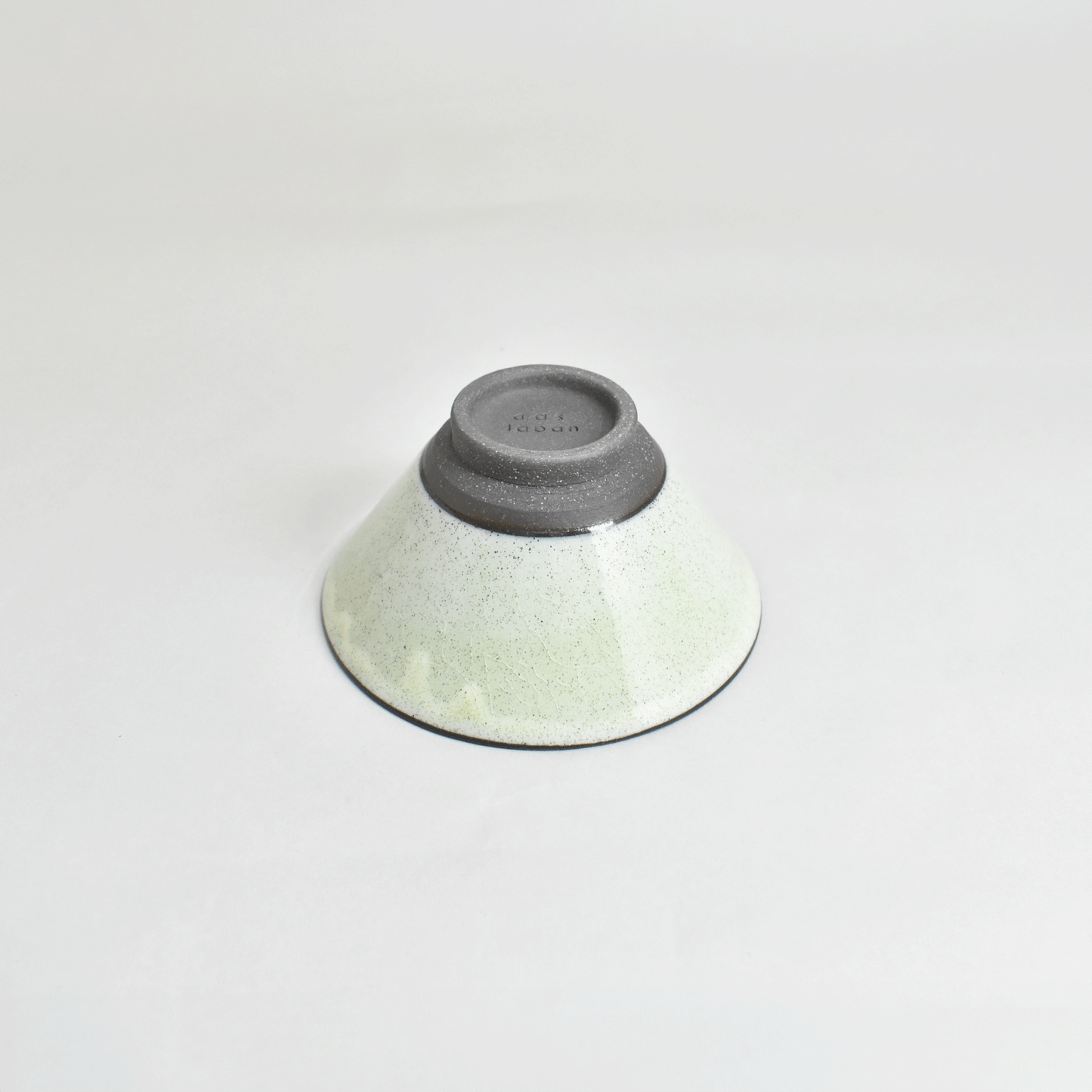 Black clay rice bowl with blue topaz