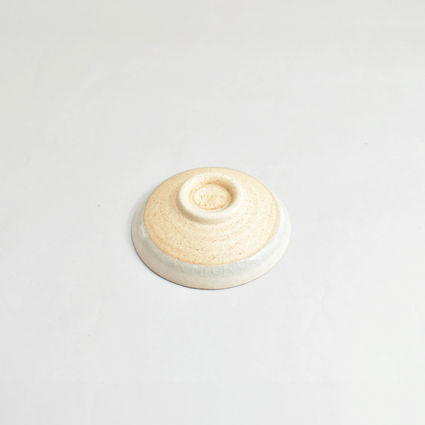 Small plate with high base