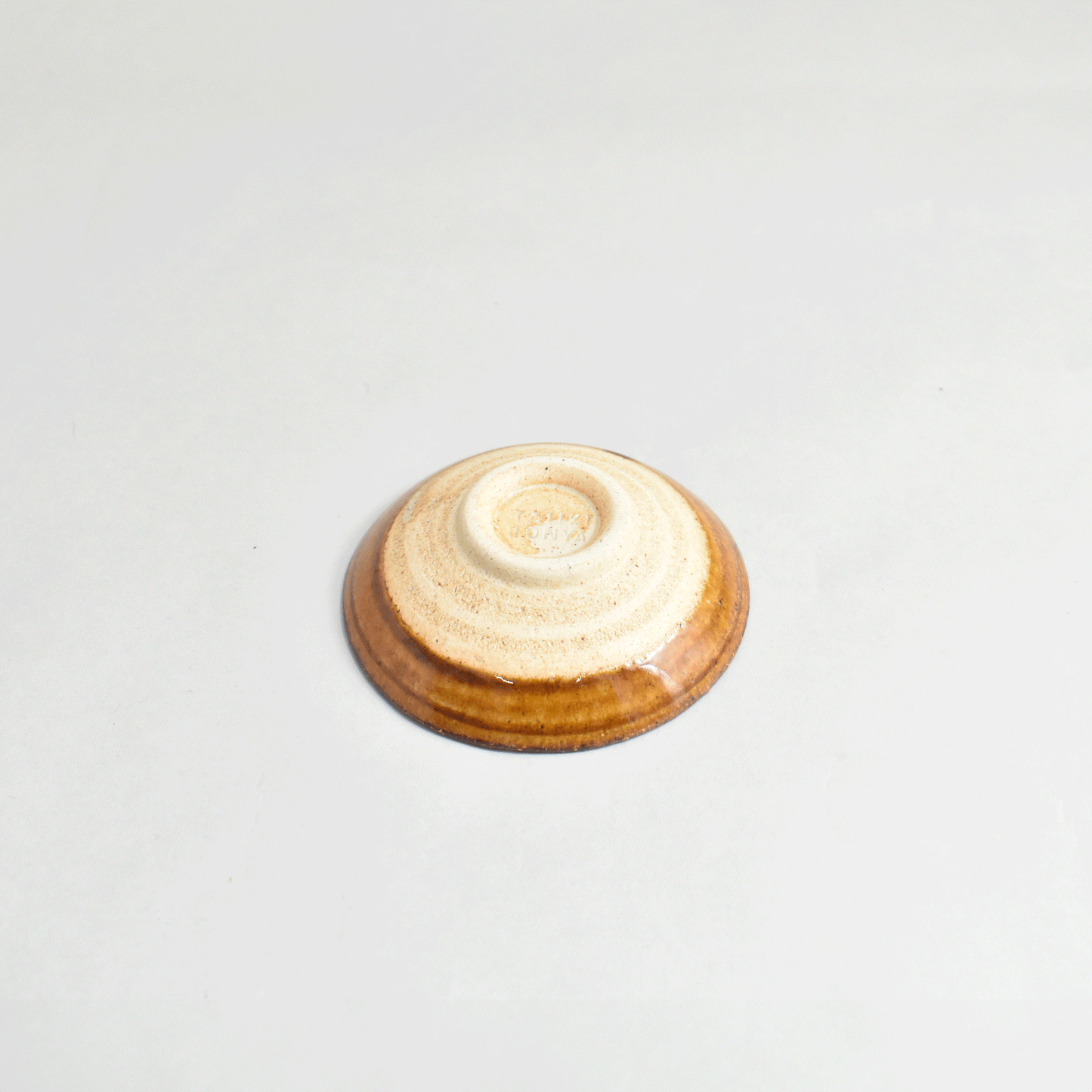 Small plate with high base