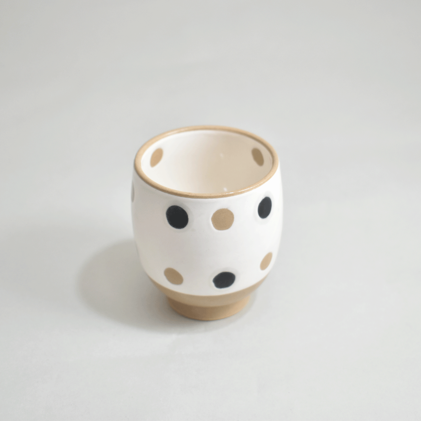 Inside and outside polka dot cup