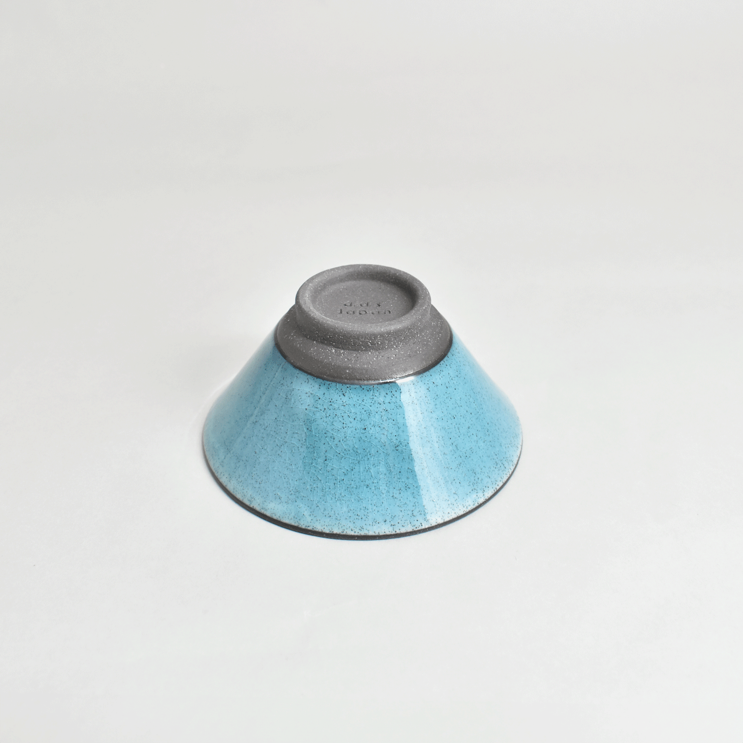 Black clay rice bowl with blue topaz