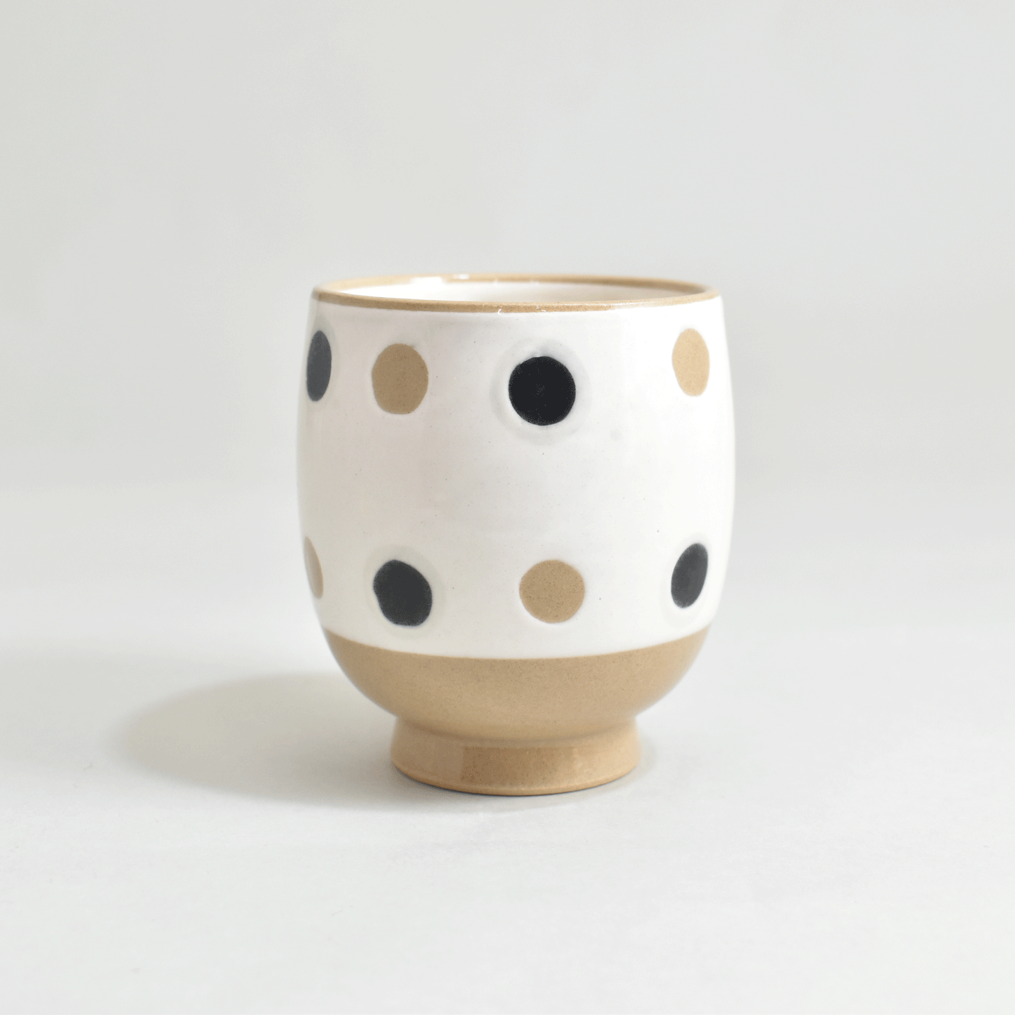 Inside and outside polka dot cup
