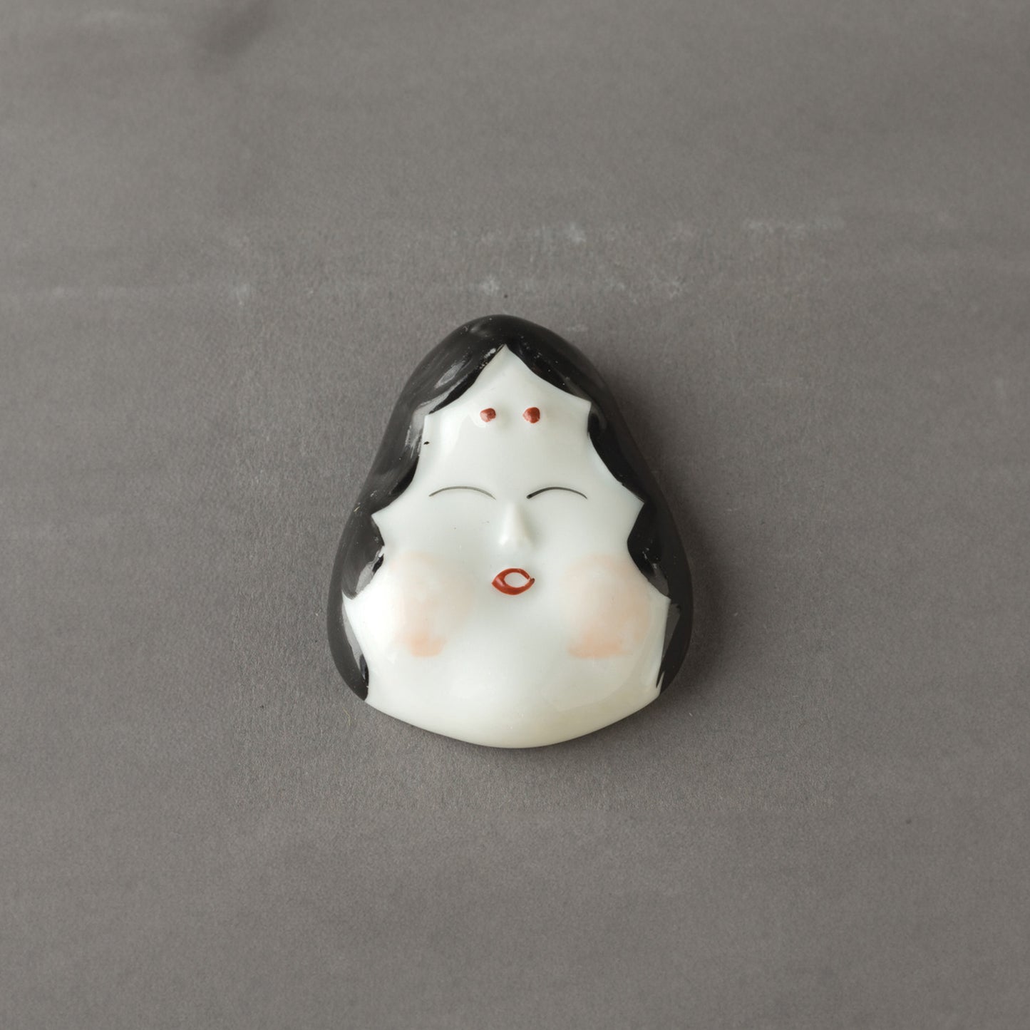 Okame Chopstick Rest