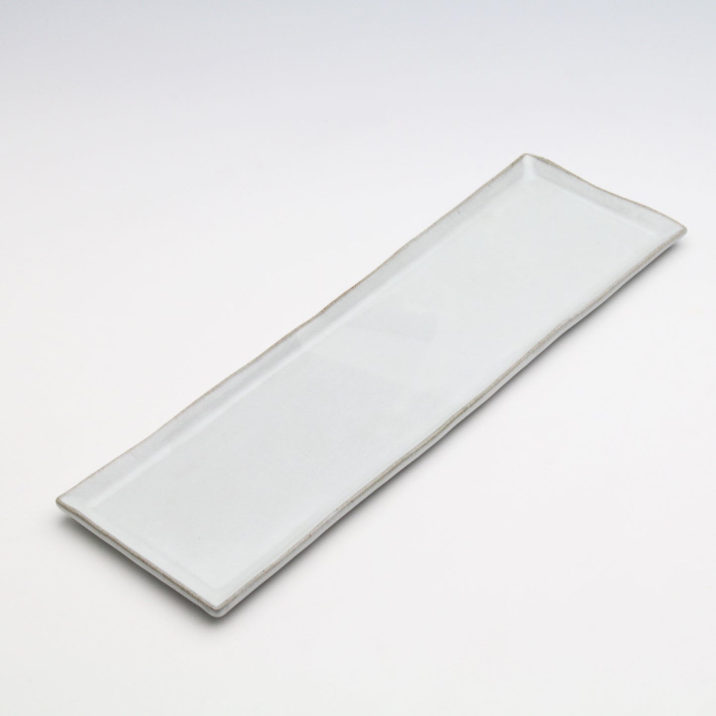 White powdered long rectangular plate