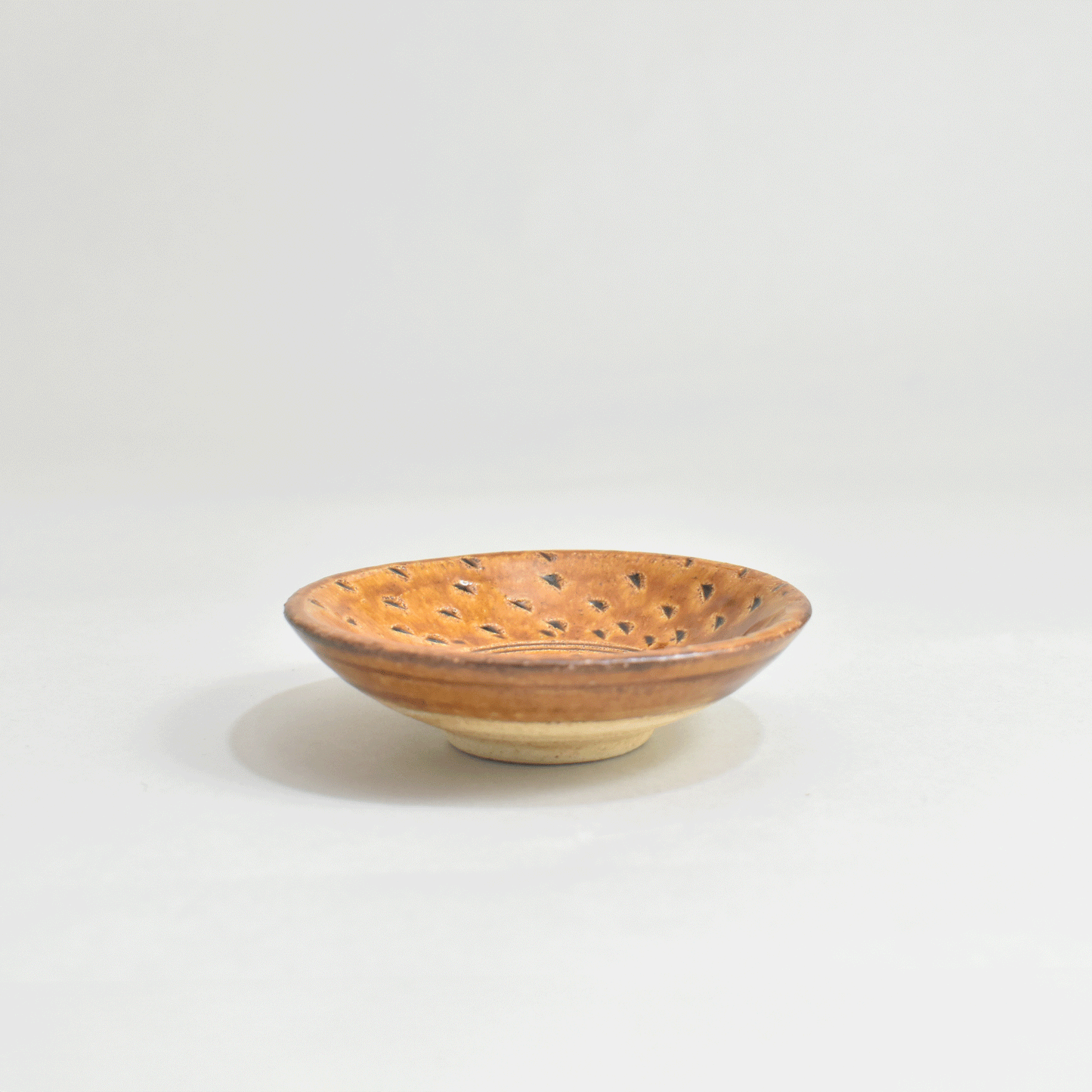 Small plate with high base