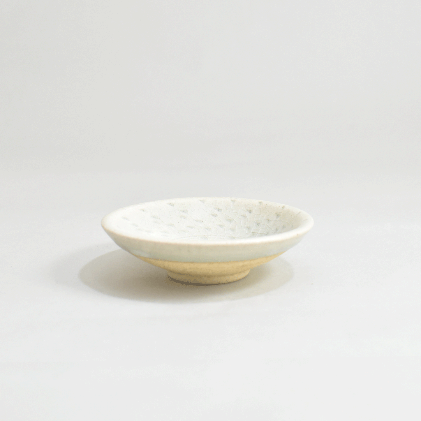 Small plate with high base