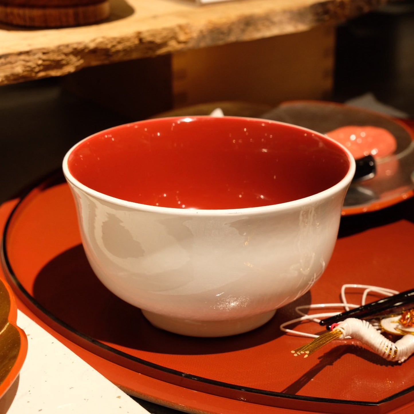 Soup bowl with white interior and red pattern