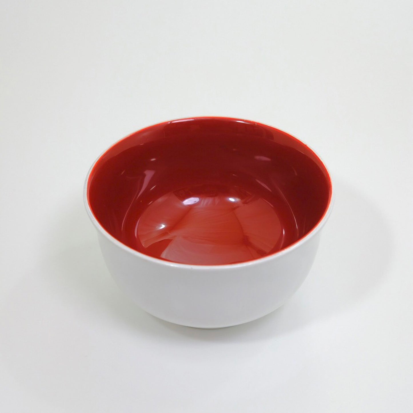 Soup bowl with white interior and red pattern