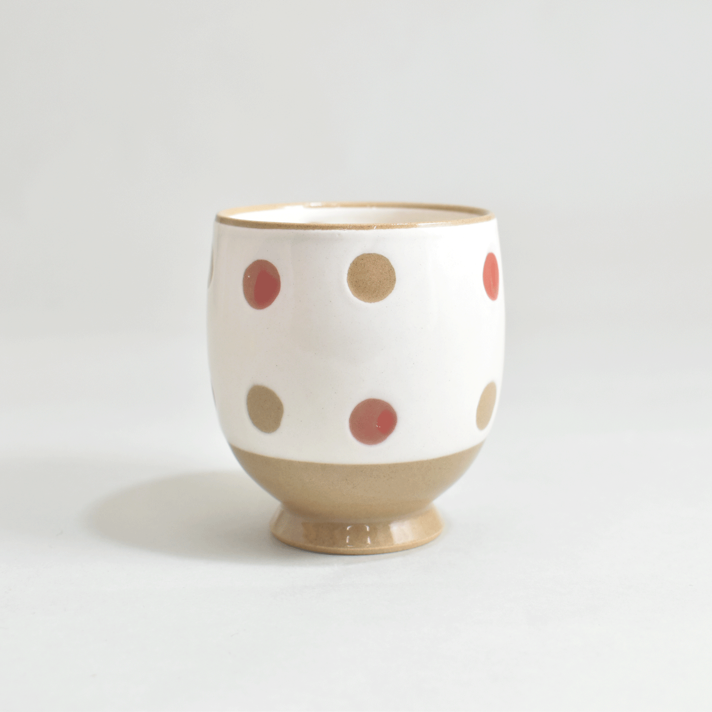 Inside and outside polka dot cup