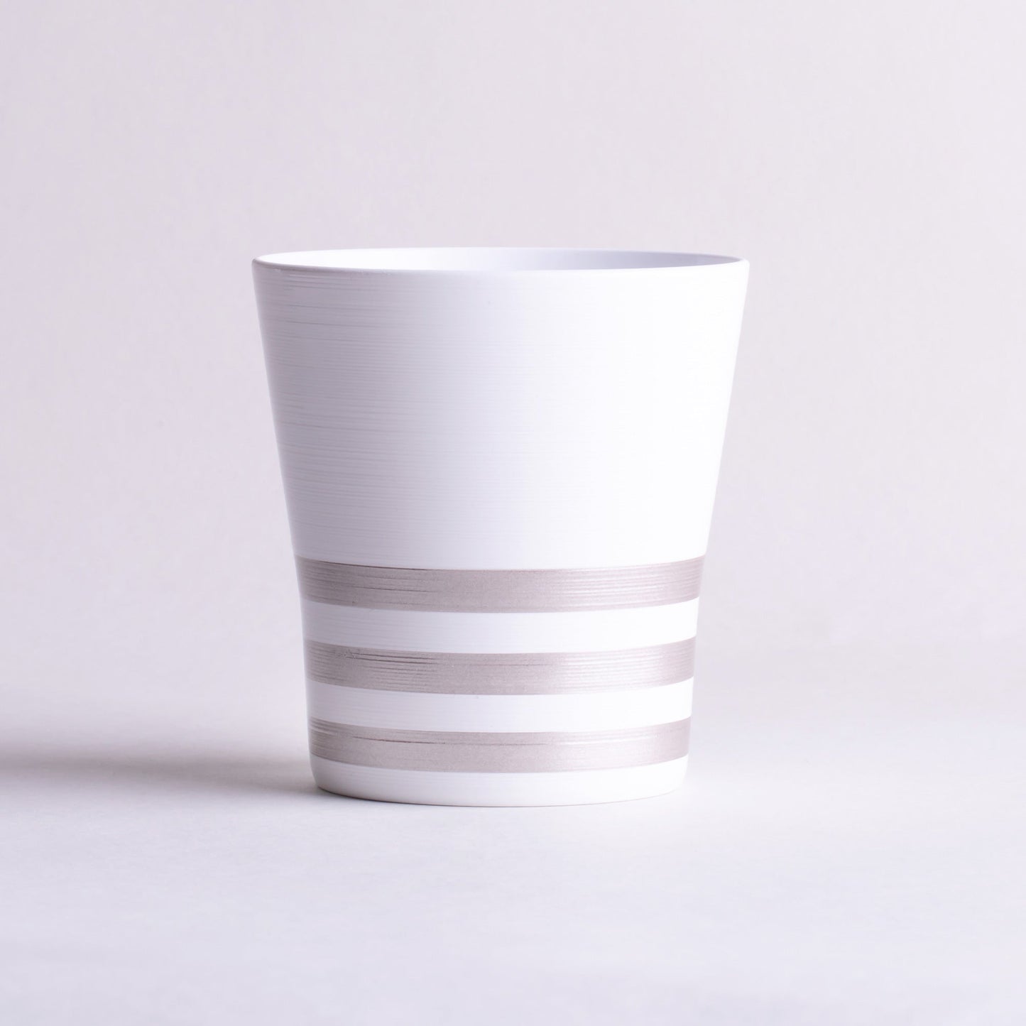 Free cup with brush lines, dishwasher safe