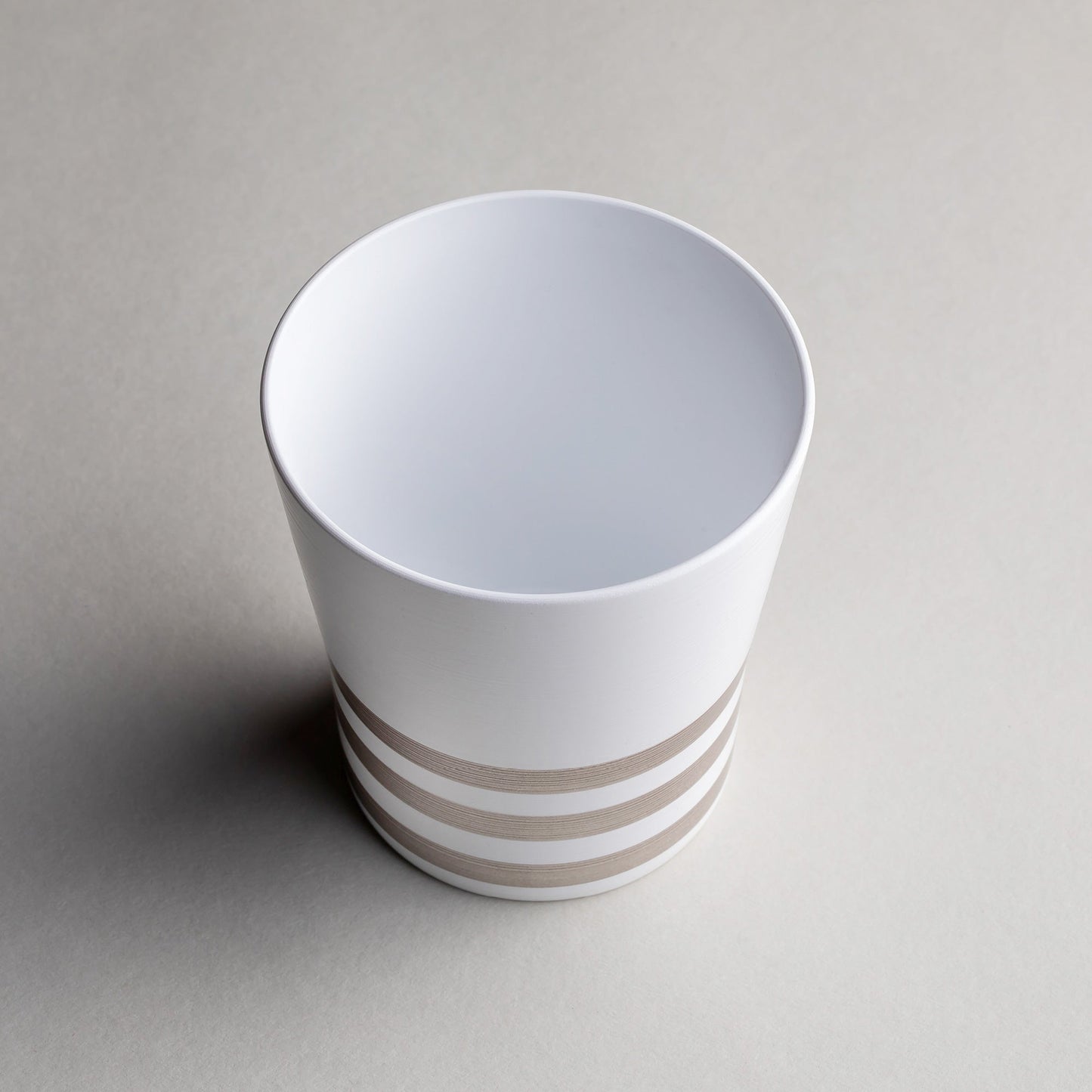 Free cup with brush lines, dishwasher safe