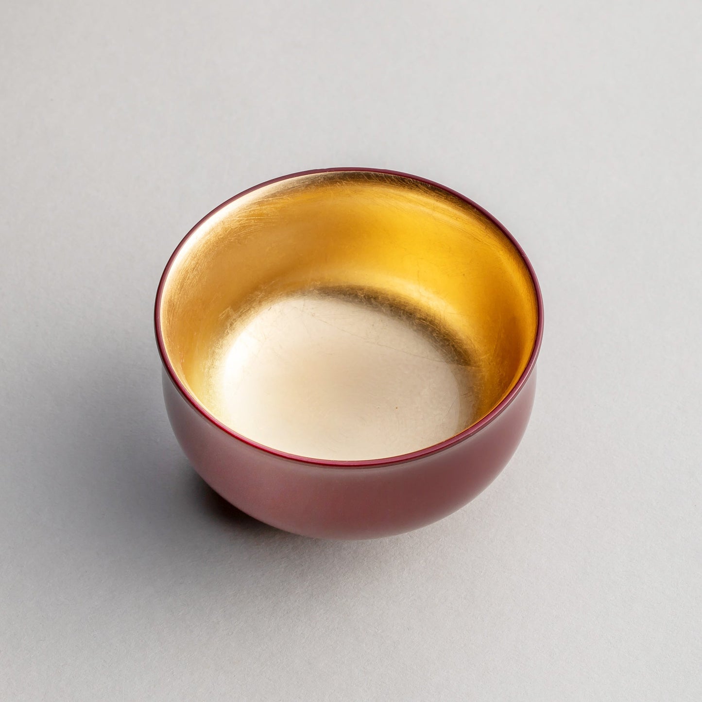 Lily-shaped sake cup with gold leaf inside