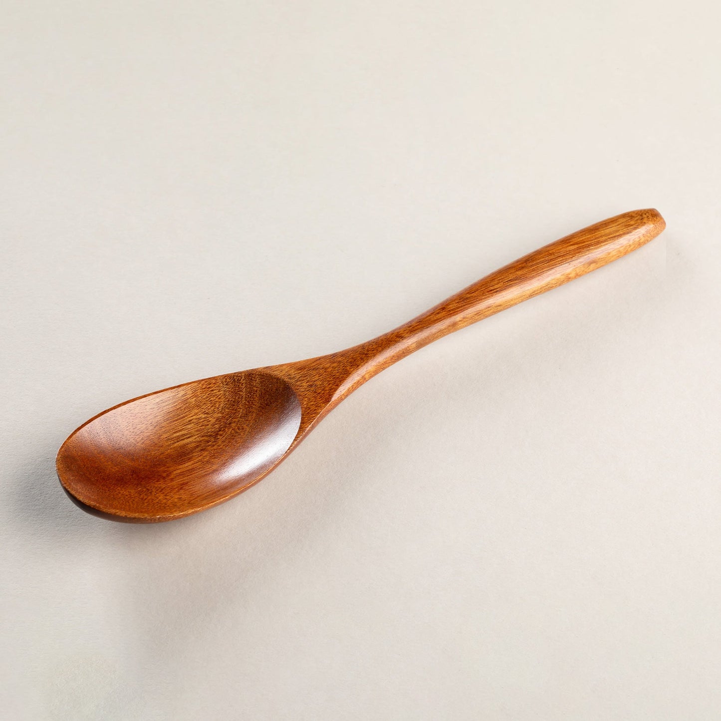 Wooden spoon with lacquer