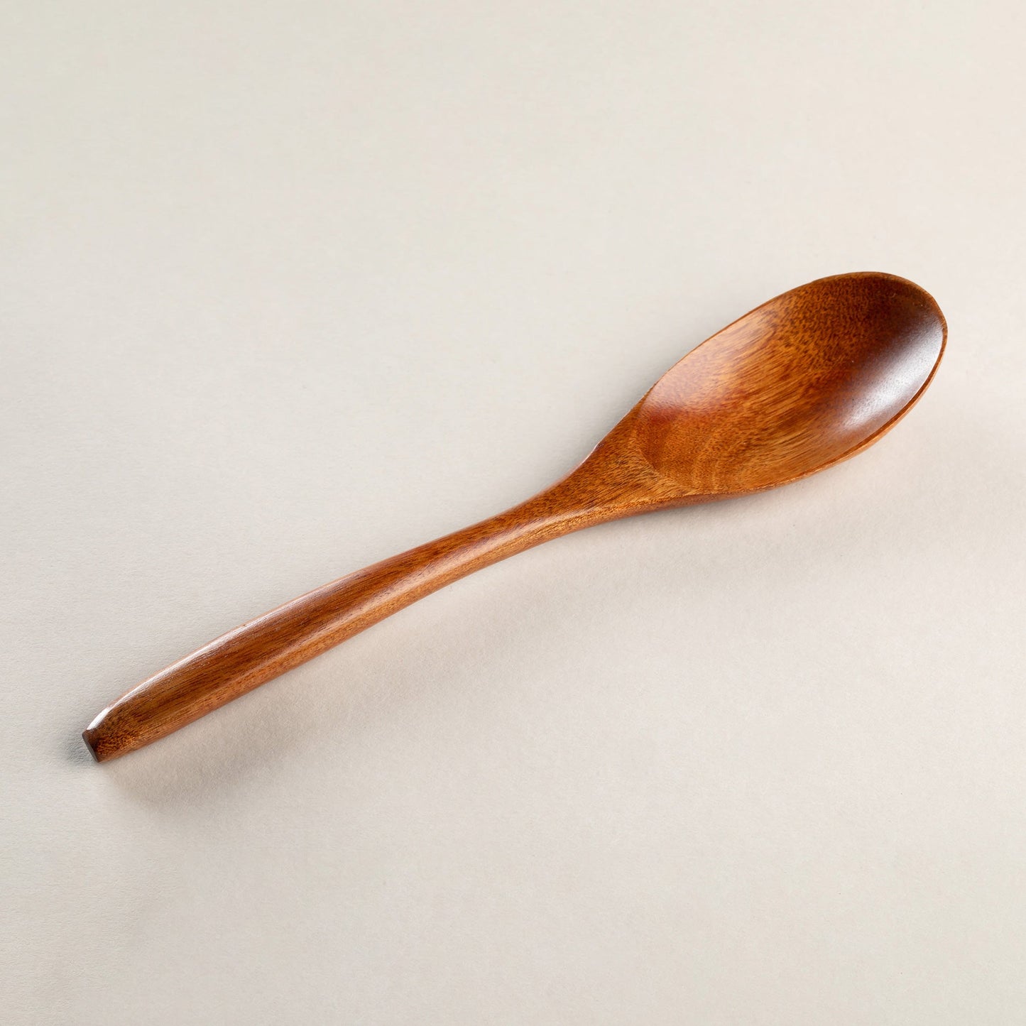 Wooden spoon with lacquer