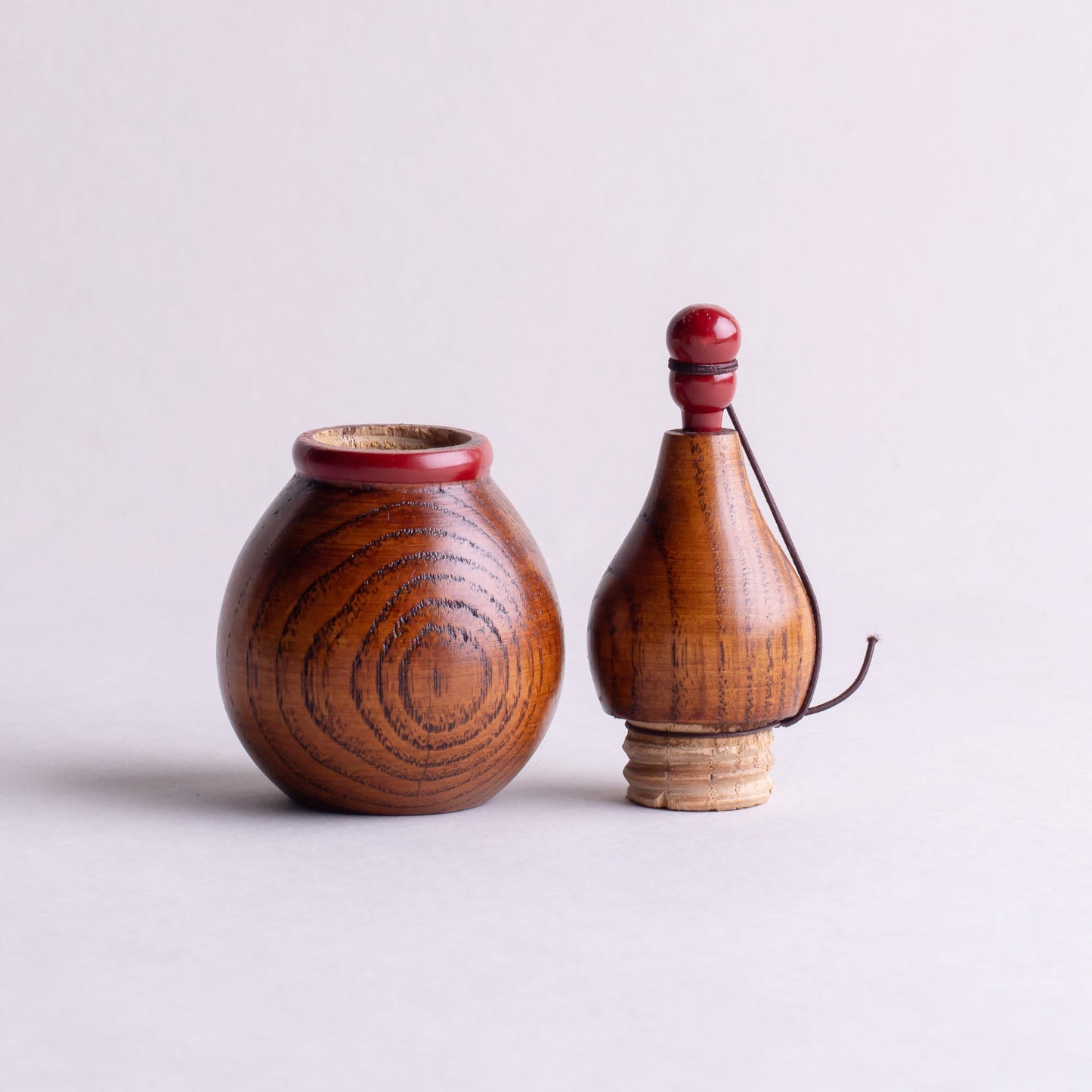 Wooden gourd shichimi container with red handle and string