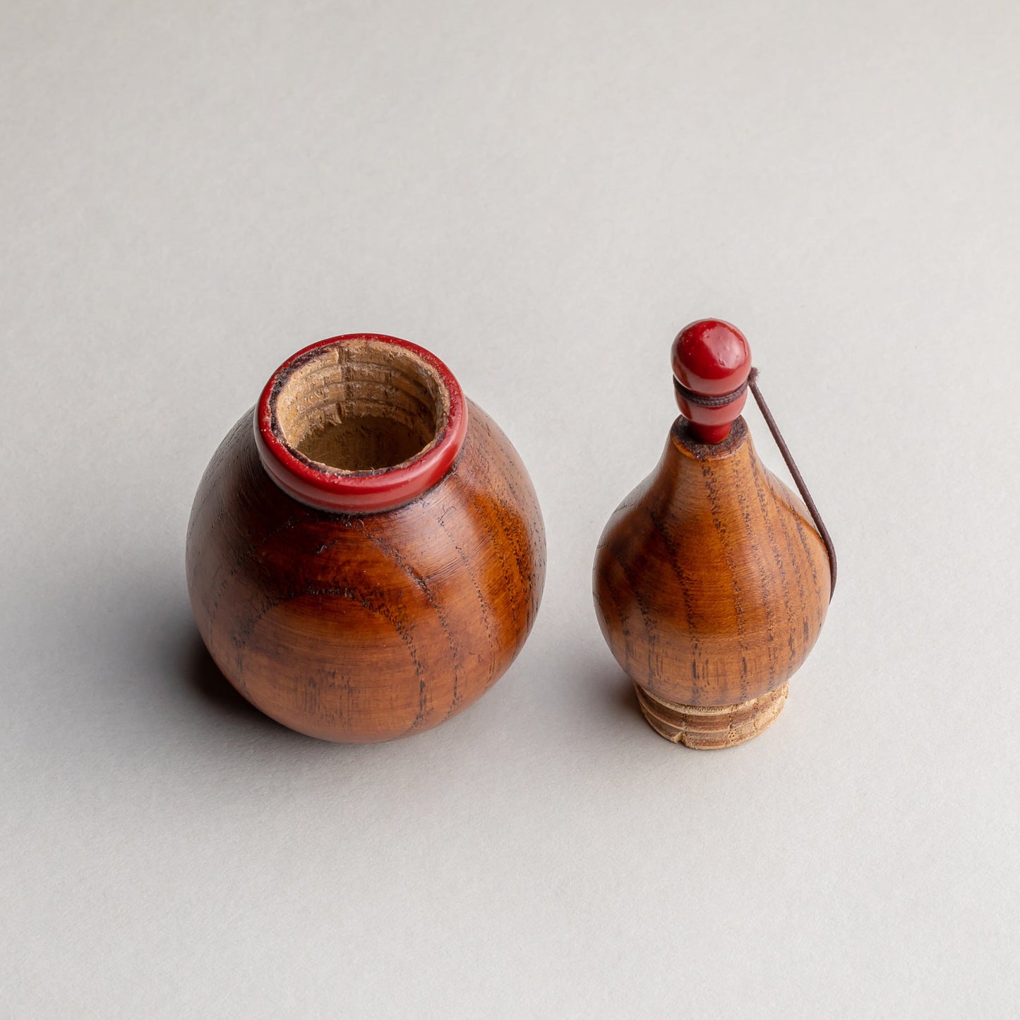 Wooden gourd shichimi container with red handle and string