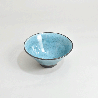 Black clay rice bowl with blue topaz