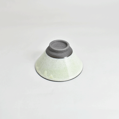 Black clay rice bowl with blue topaz