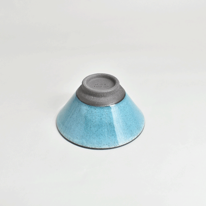 Black clay rice bowl with blue topaz