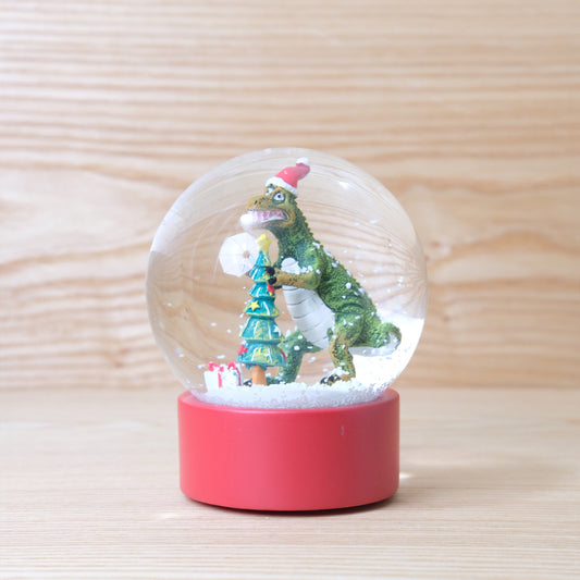 Dinosaur snow globe