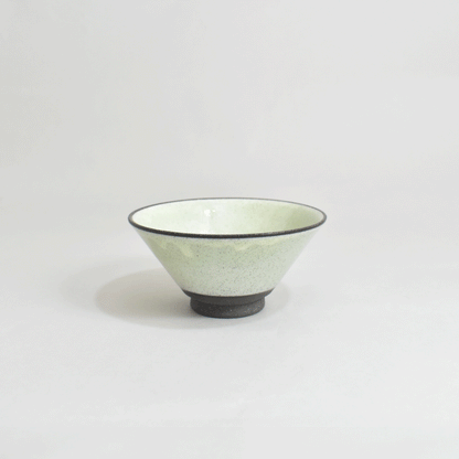 Black clay rice bowl with blue topaz