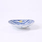 Small oval plate with flowing water and floral design